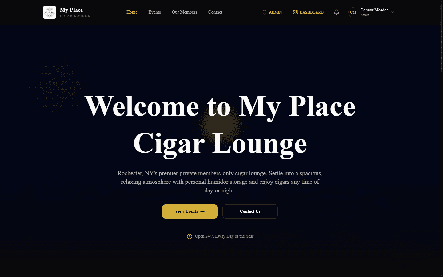 Dark hero with gold accents and centered serif headline on the public homepage